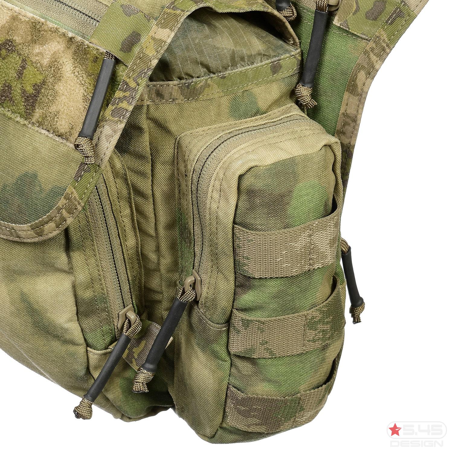 On one side of the bag is a pouch with a MOLLE mesh.